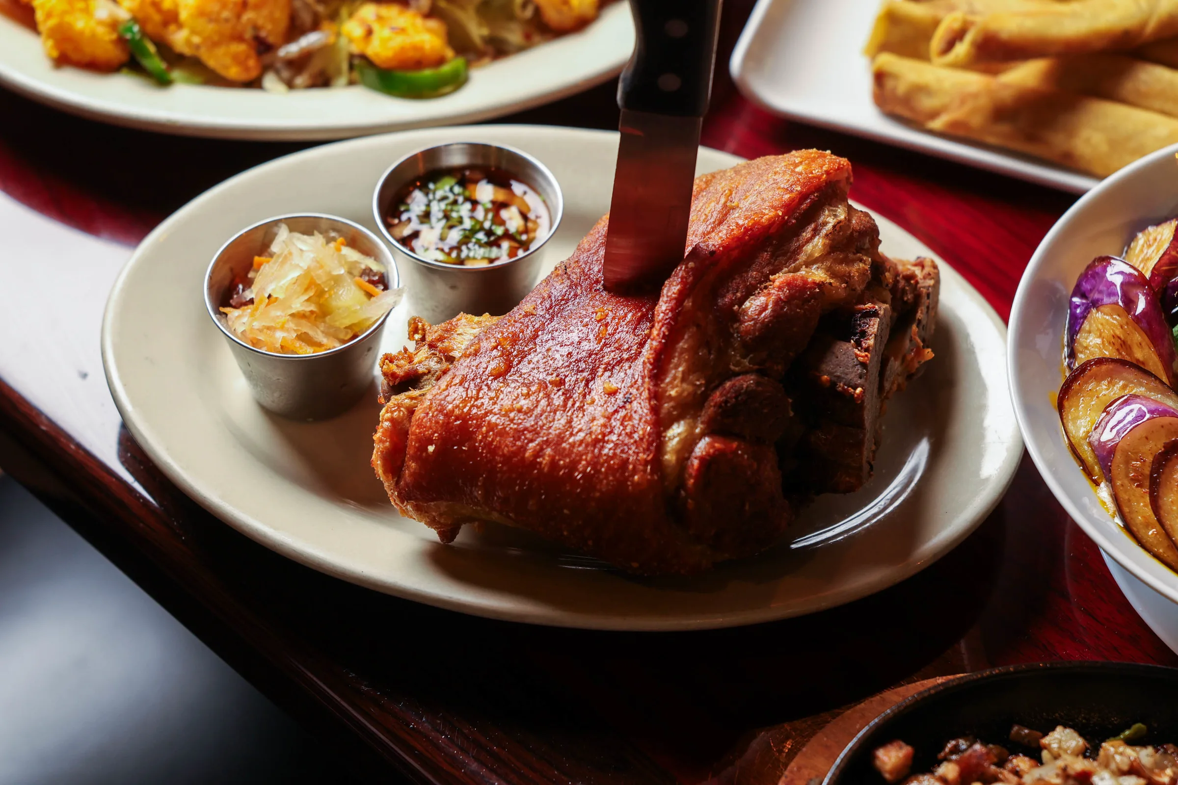 Crispy pata on a red tablecloth